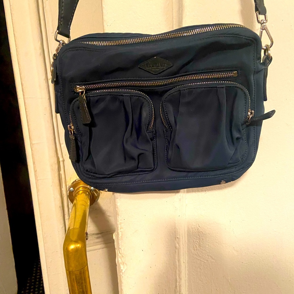Tan suede shoulder bag/attached purse.
